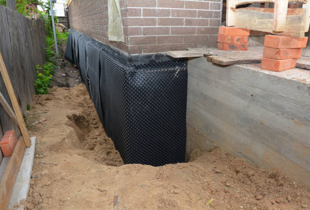 Happy homeowners after waterproofing job in Cliffside Park